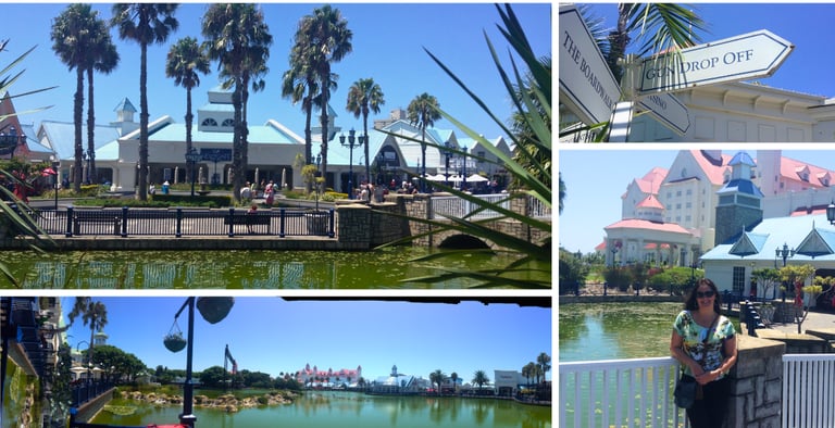 Autora explorando o Boardwalk em Port Elizabeth (Nelson Mandela Bay), com lojas, entretenimento e lago ao fundo