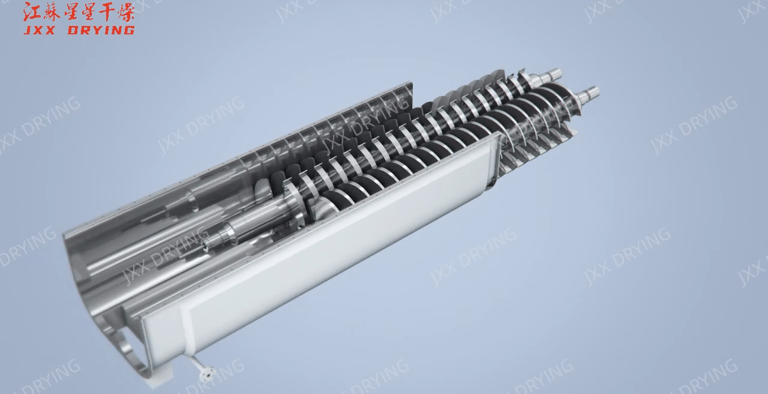 Close-up view inside a paddle dryer, showcasing the installed wedge-blade desig