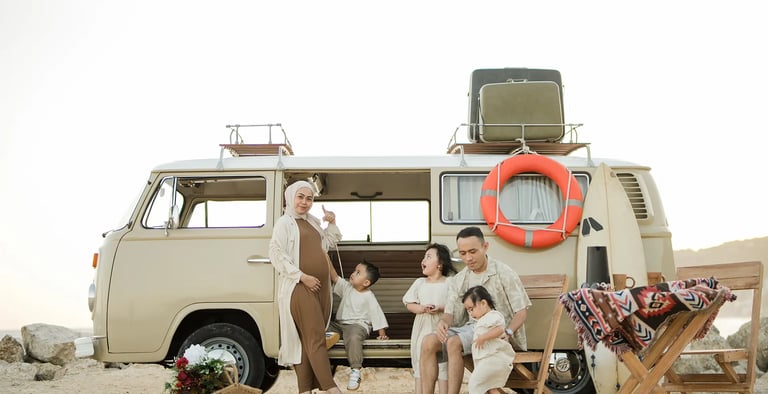 Relaxed picnic style family photography session with vintage combi van at Melasti Beach Bali