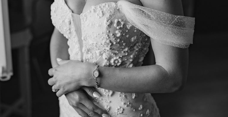 a woman in a wedding dress with a veil on her shoulder wedding in Bordeaux