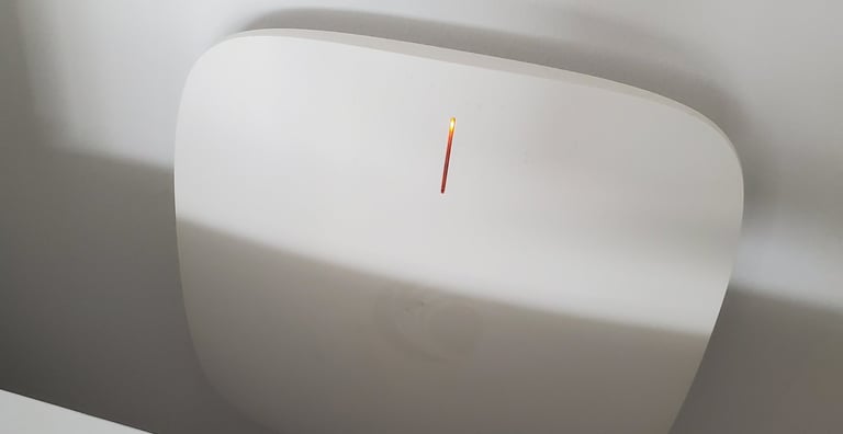 wireless access point on a wall