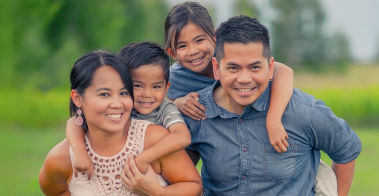 a family of three children posing for a picture