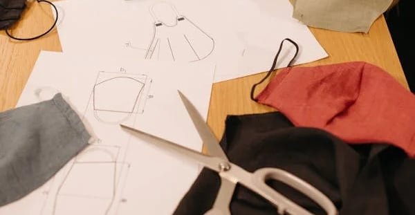 Fabric sourcing and layout for low MOQ clothing production
