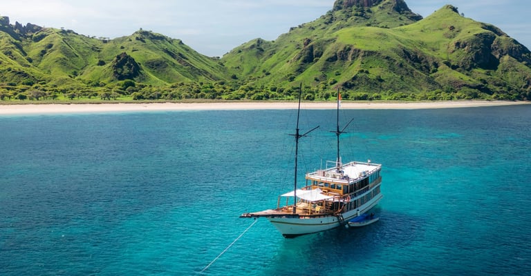 Boat anchored off the coast of Lombok, Indonesia, with turquoise waters and scenic island landscapes