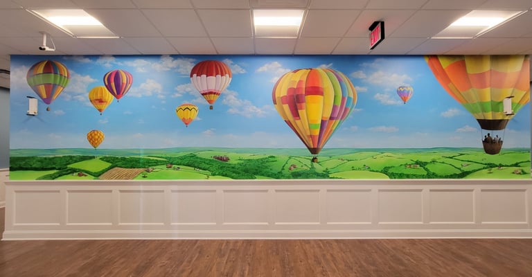bespoke mural of hot air balloons by marcine for a residential adult facility in warrren, nj
