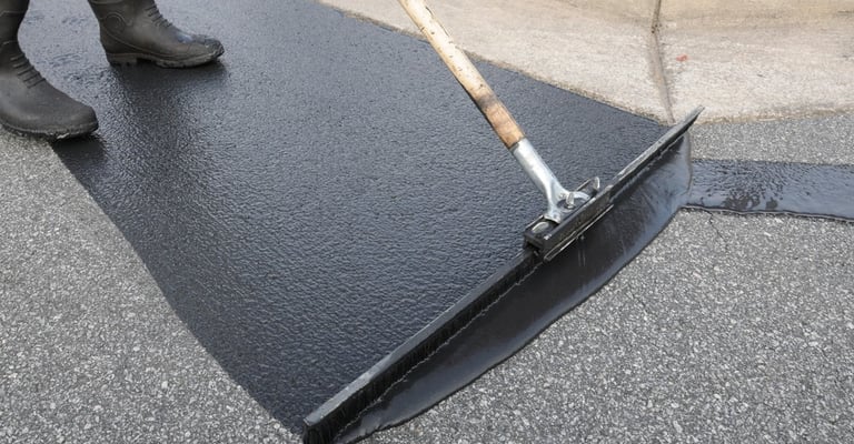 Sealcoating a driveway prevents further damage