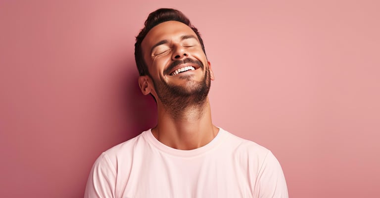 man smiling with eyes closed