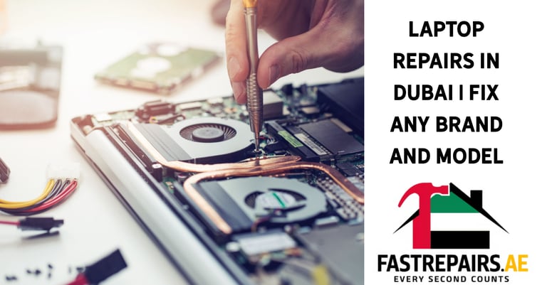 a laptop computer repair technician repairing a laptop