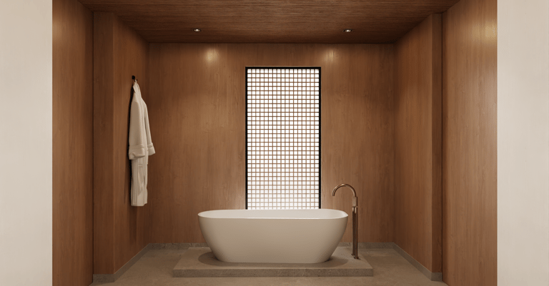Freestanding bathtub in wood-paneled minimalist bathroom with soft lighting and grid-screen window.