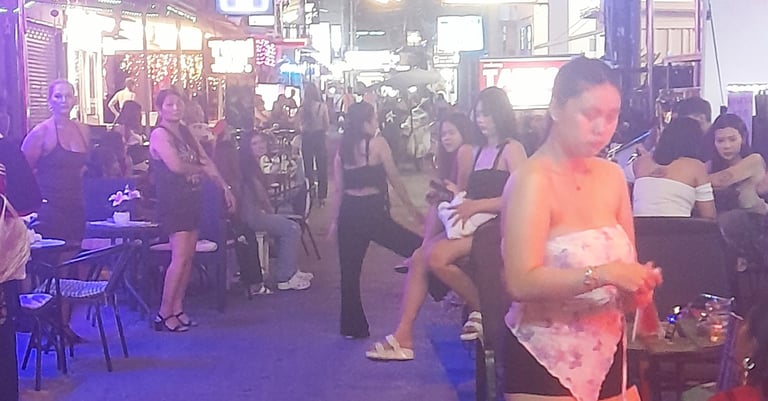 Thai women outside bars on Soi Bintabaht, Hua Hin in Thailand