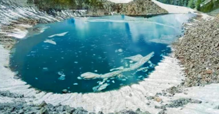 Ansoo lake with ice and snow on the ground
