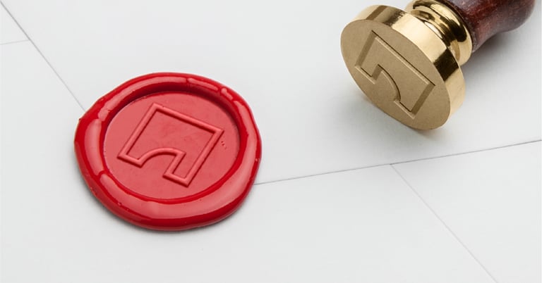 a waxed stamper stamper on a piece of paper