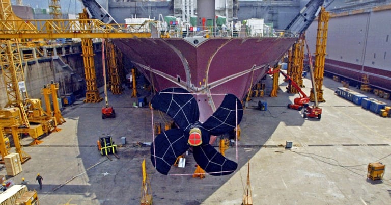 a large boat in a dry dock getting repairs