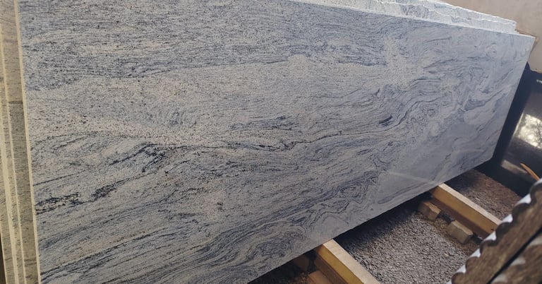 Polished white and grey marble granite slabs with wavy veins for luxury kitchen countertops.