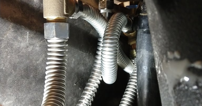 plumbing inside custom tub