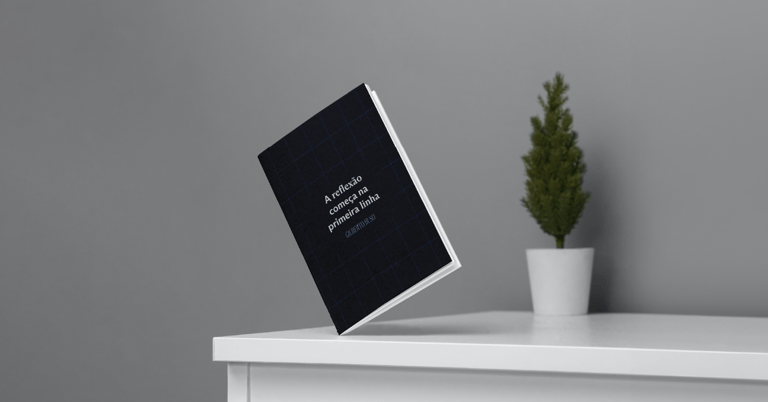 a book with a plant in a potted planter