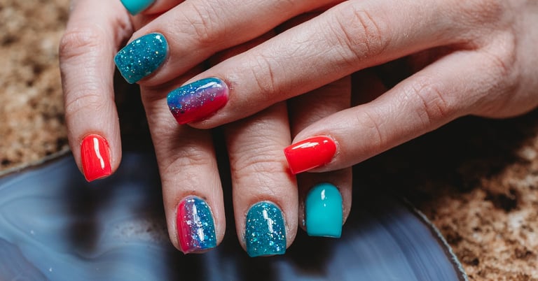 red and blue, bright finished acrylic nails by Alex in Missoula