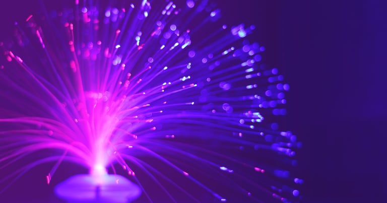 a purple fiber optic light lit up with purple lights