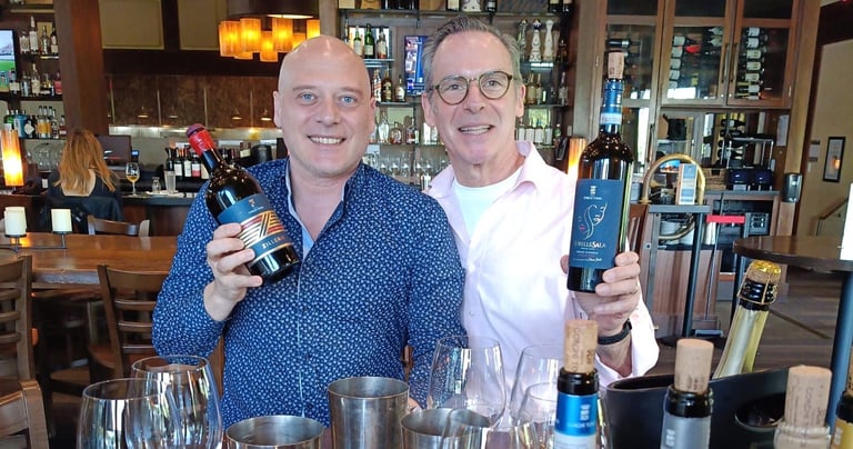 wine professional and wine producer showcasing their newly imported selections