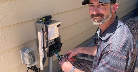 technician fixing a transformer in Peyton Colorado