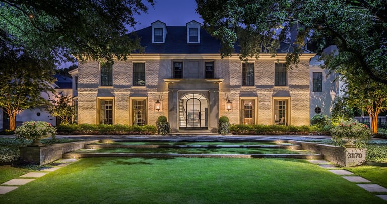 moon lighting a front lawn and house facade lighting