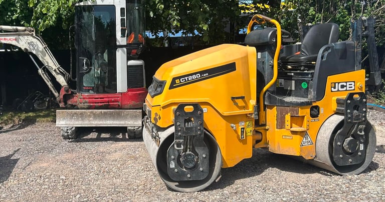 Twin-drum roller hire compacting new driveway in Stourbridge