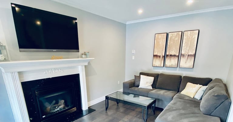 Image of previous client's house nicely painted living room