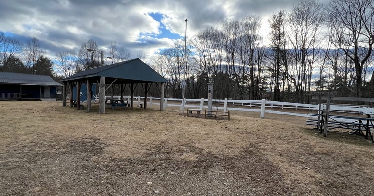 a horse arena and a clubhouse