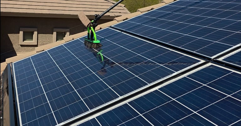solar panel cleaning with brush on a pole
