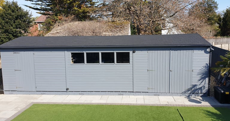 a shed with a new felt roof in Hamworthy