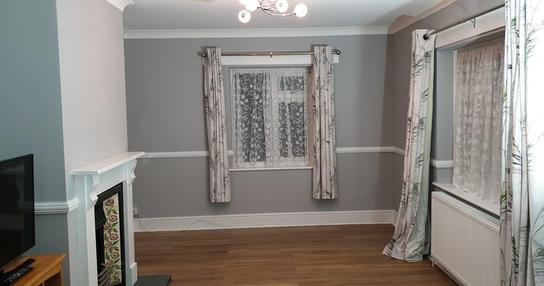 a freshly decorated grey living room in Bournemouth