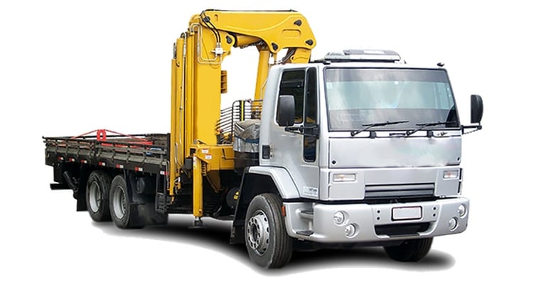 Caminhão Munck 10 toneladas movimentando máquinas industriais