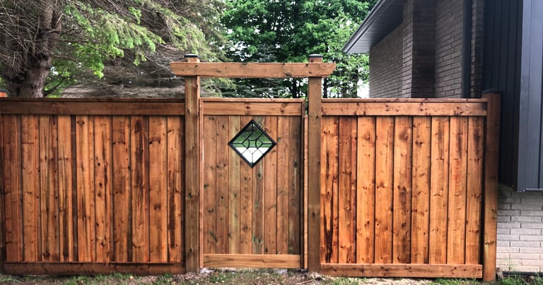 Image of previous project of a stained fence