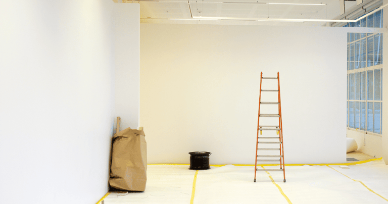 a ladder in an office undergoing remodeling