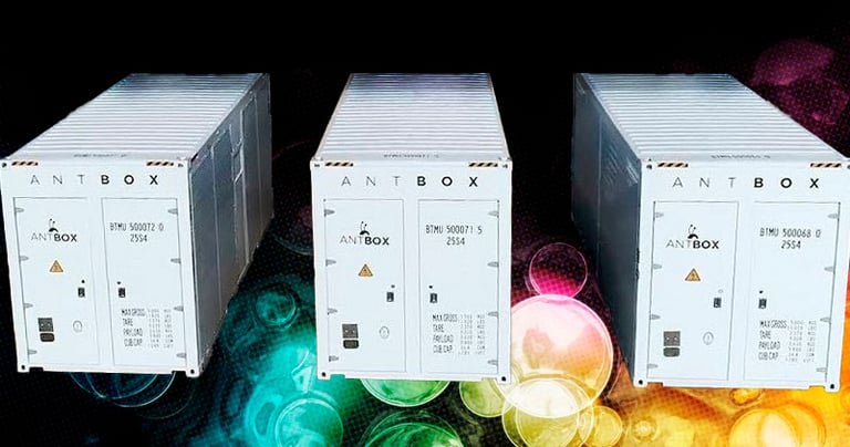Three Bitmain Antbox mobile crypto mining containers for large-scale data center infrastructure.