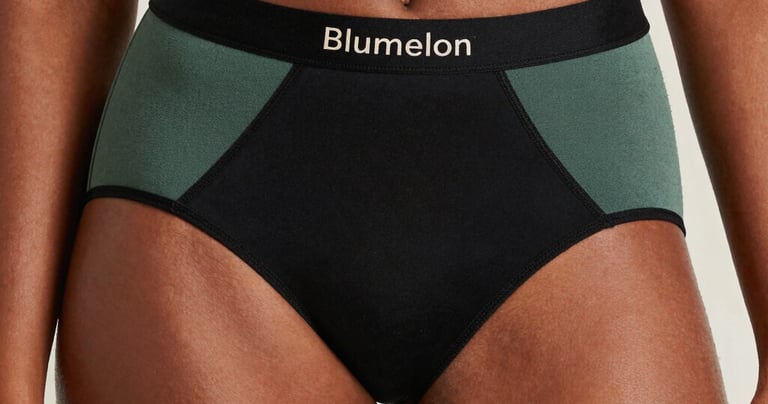 Strong absorbency menstrual underwear displayed with water droplets to emphasize leak protection.