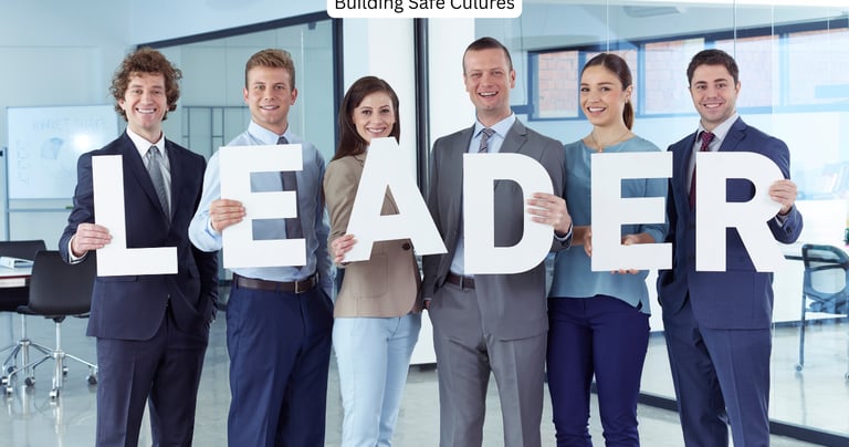 Leaders holding letters each letter spelling LEADER after workshop