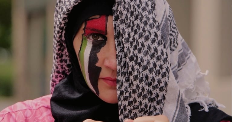 a woman with a black and white face paint on her face