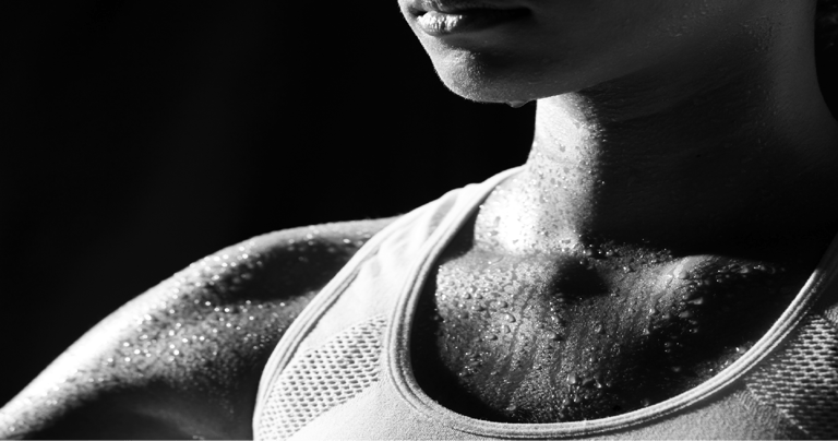 a woman with a black and white photo of her face and body