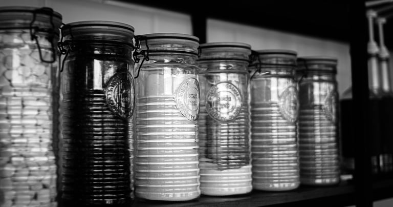 black-and-white glass jars