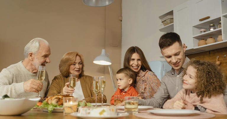 a family gathering at a dinner table