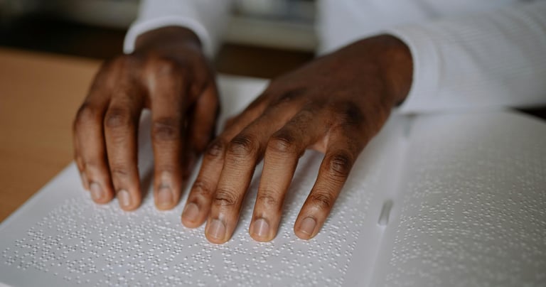a person's hands on a book