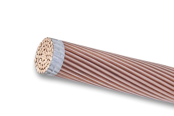 a close up of a copper colored cable wire with a copper colored wire Kabel Metal Indonesia