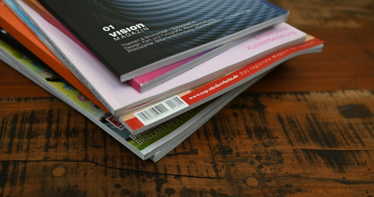 Stack of magazines representing editorial and publishing licensing opportunities for Julie Diehl Art
