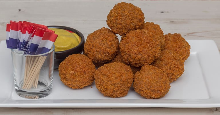 a plate of fried fried chicken nuggies
