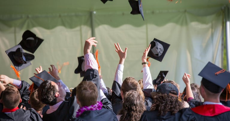a few students at a graduation ceremony