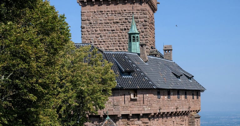 a large brick building with a clock tower
