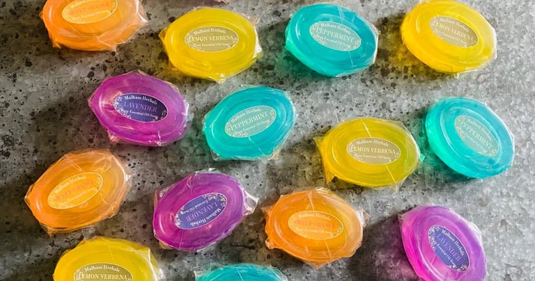 Colourful essential oil soaps with plastic-free wrapping