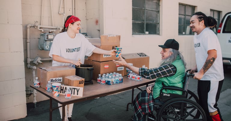 a man in a wheelchair wheel chair with a woman in a wheelchair