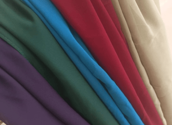 a bunch of different colored fabrics and fabrics stoler